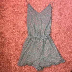Lace Turquoise Romper w/ cross straps in the back!